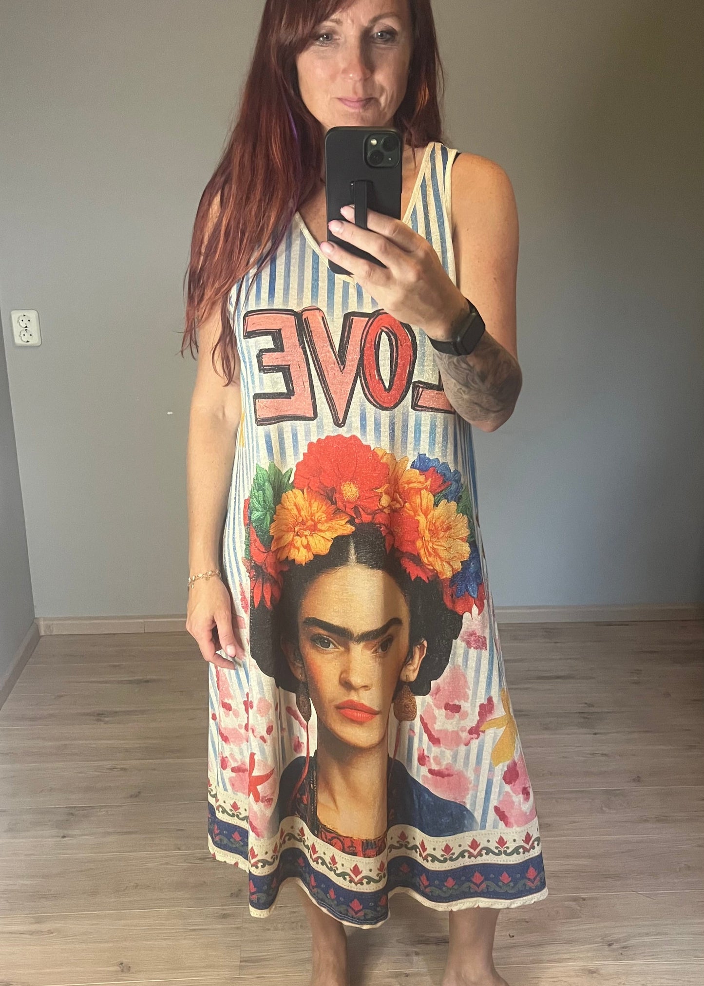 Schitterende lurex jurk met een damesprint.