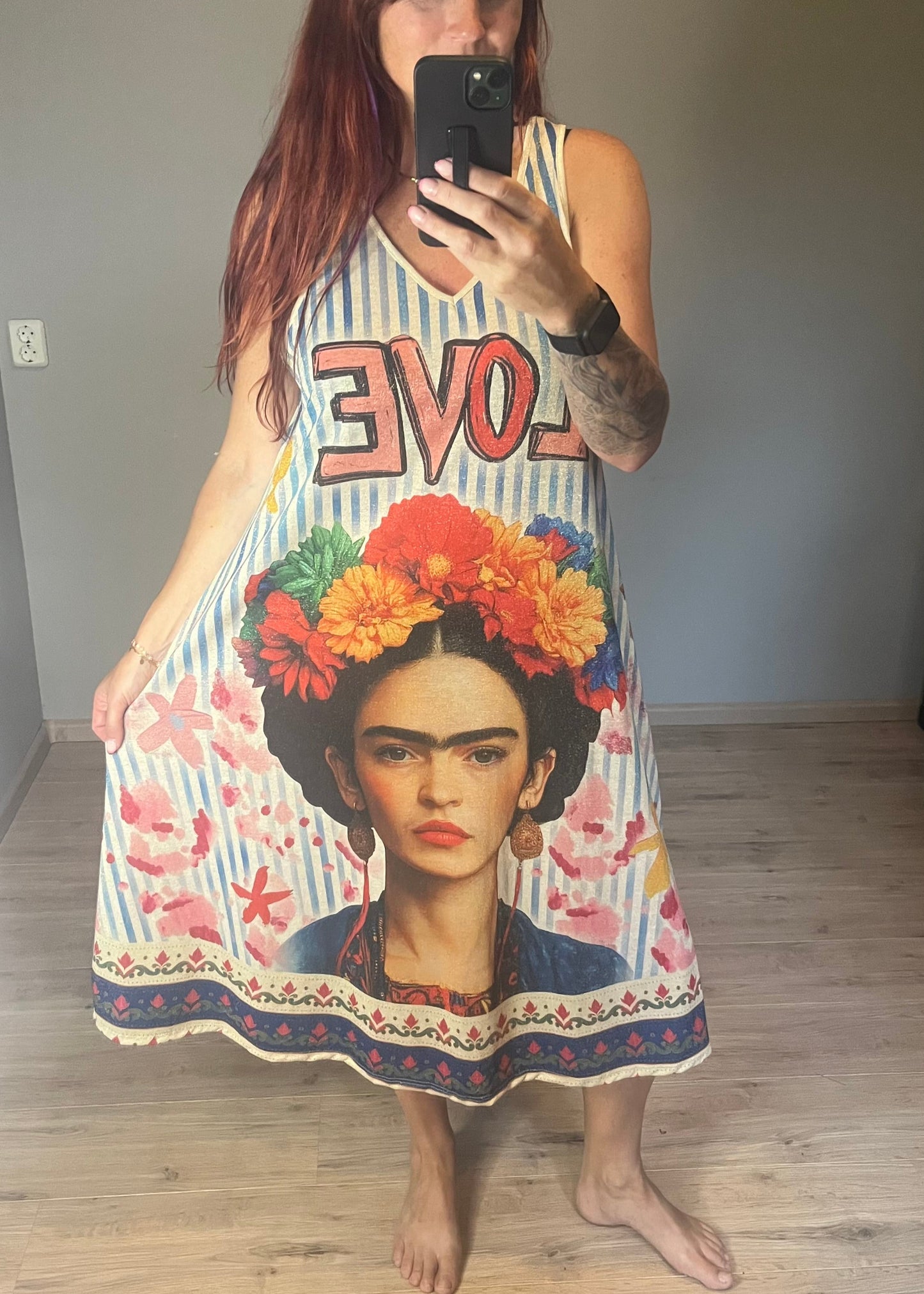 Schitterende lurex jurk met een damesprint.