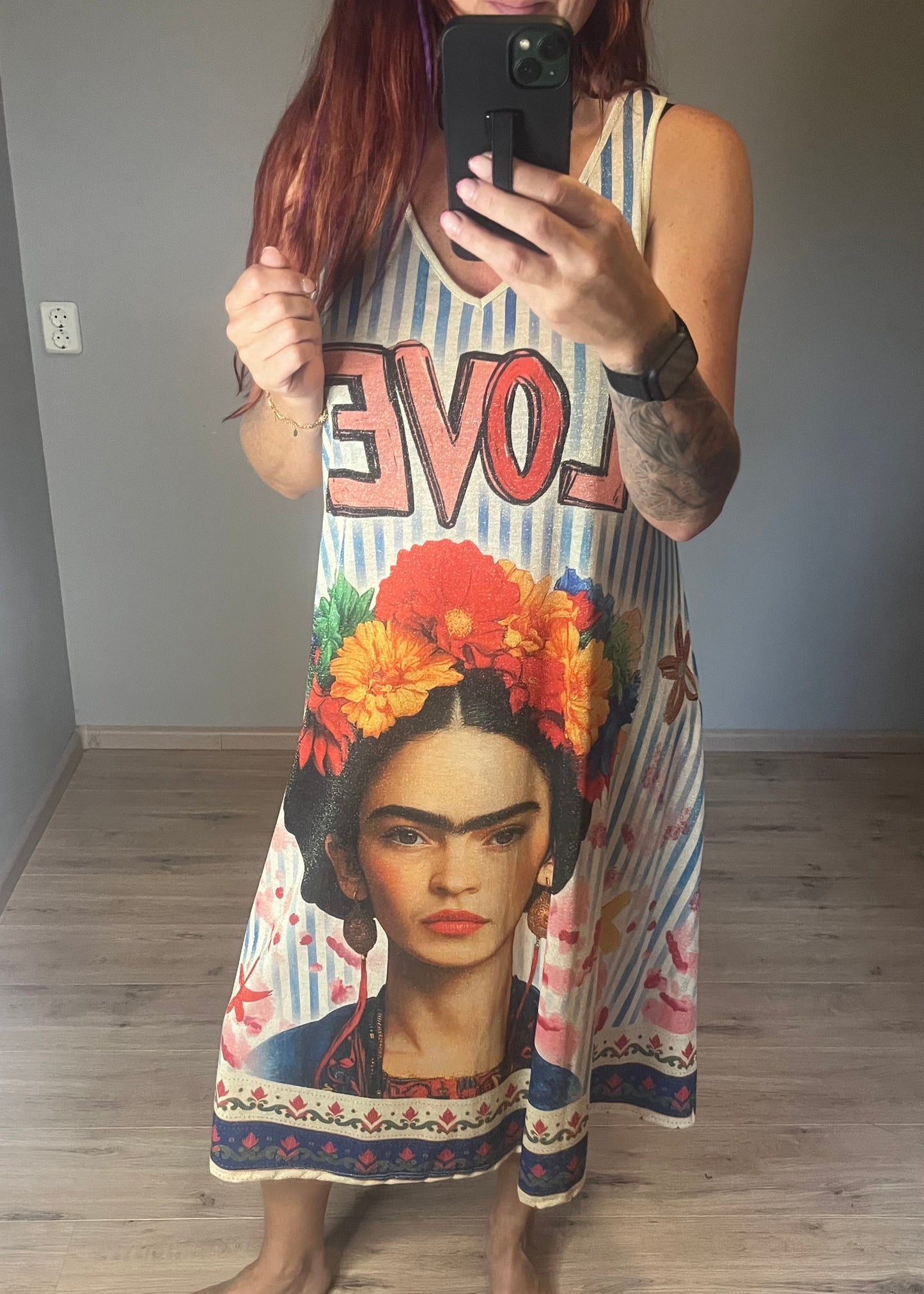 Schitterende lurex jurk met een damesprint.