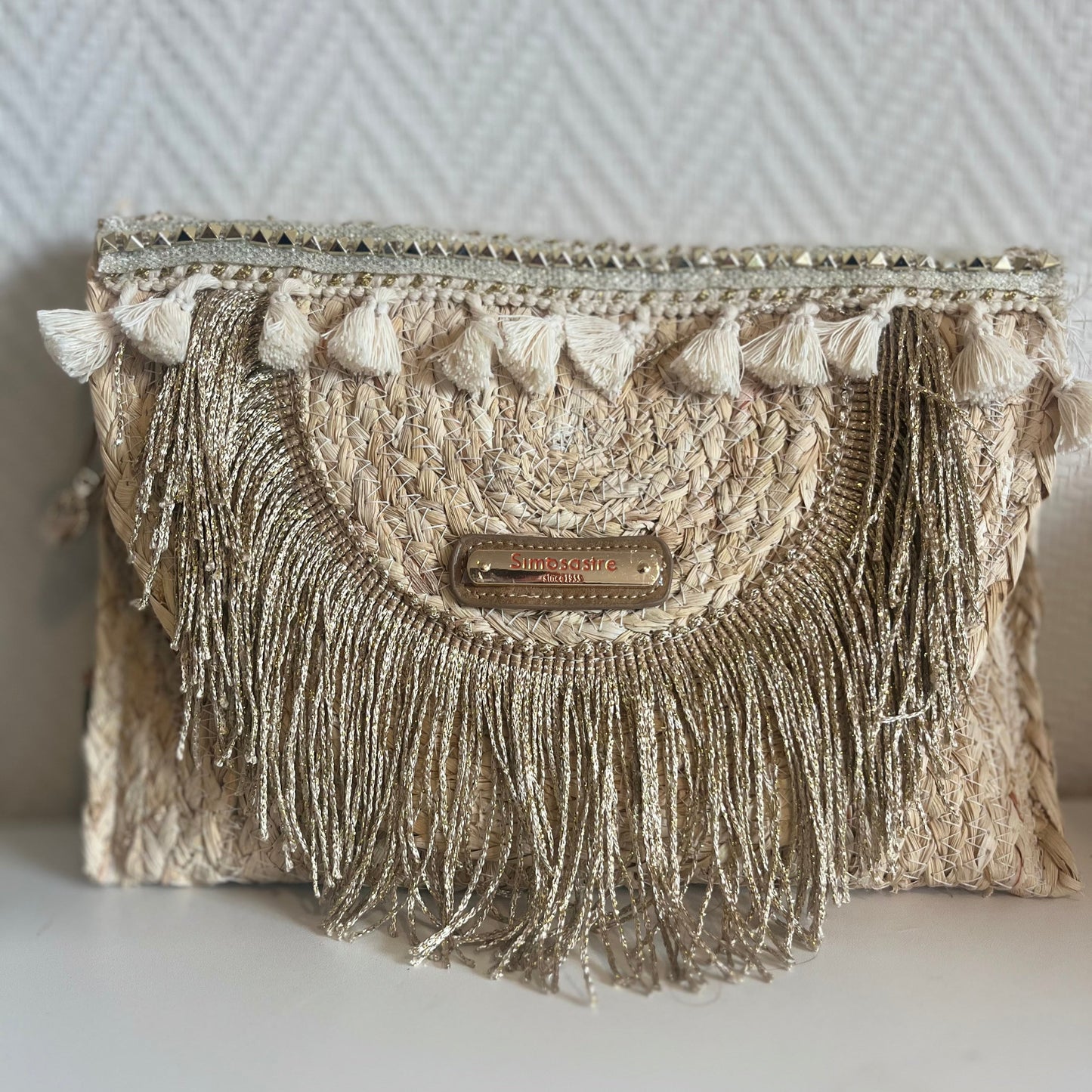 gold fringe clutch met gouden franjes in ibiza look