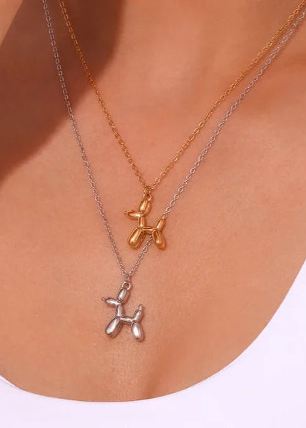 Stainless steel ketting met speelse balloon dog hanger in goud of zilver. Trendy en duurzaam sieraad.