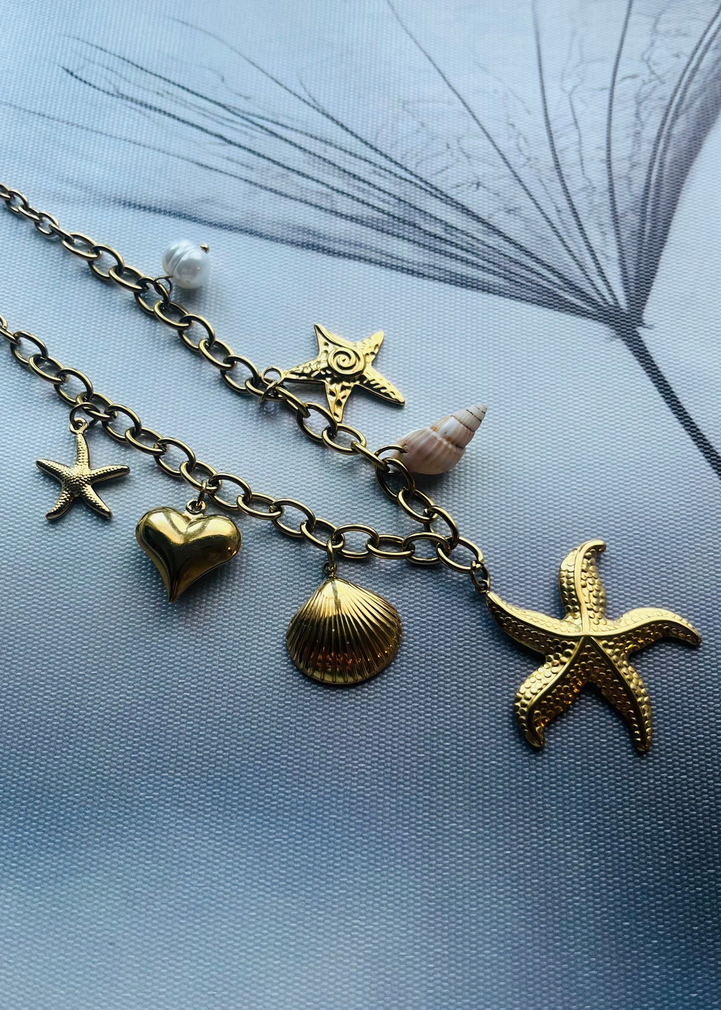 Stainless steel damesketting met beach bedels – schelpen, zeesterren, schildpadjes & meer. Verkleurt niet, waterproof, zomers & trendy.