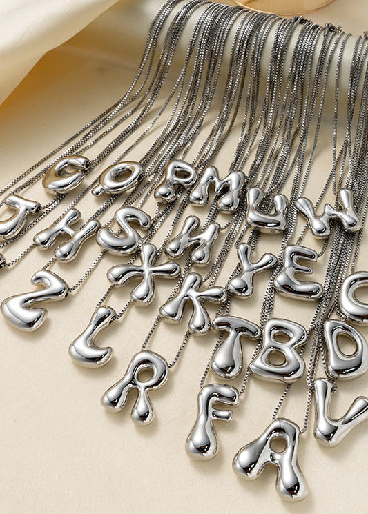Stainless steel ketting met letter hanger in bubble vorm in goud of zilver van Piek Fashion