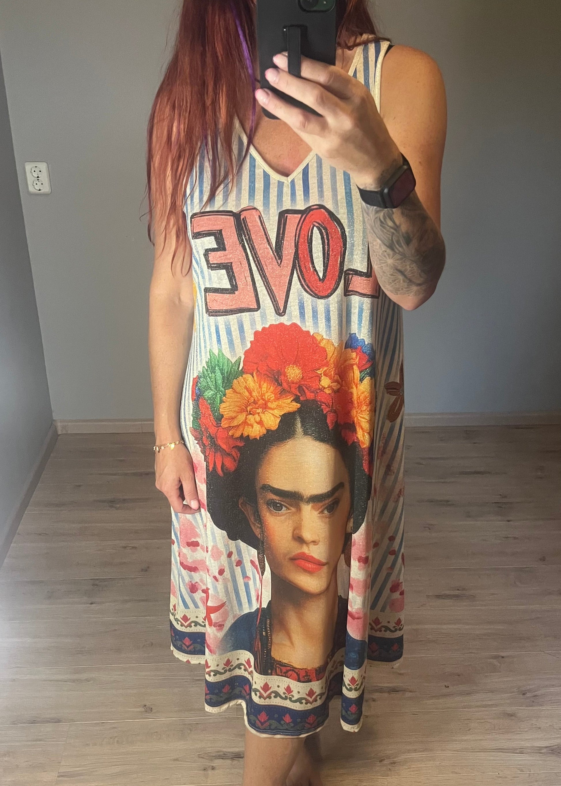 Schitterende lurex jurk met een damesprint.