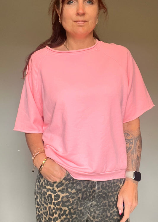Oversized pastel shirt-trui voor dames van 100% katoen met korte mouwen in roze, geel, oranje en blauw van Piek Fashion