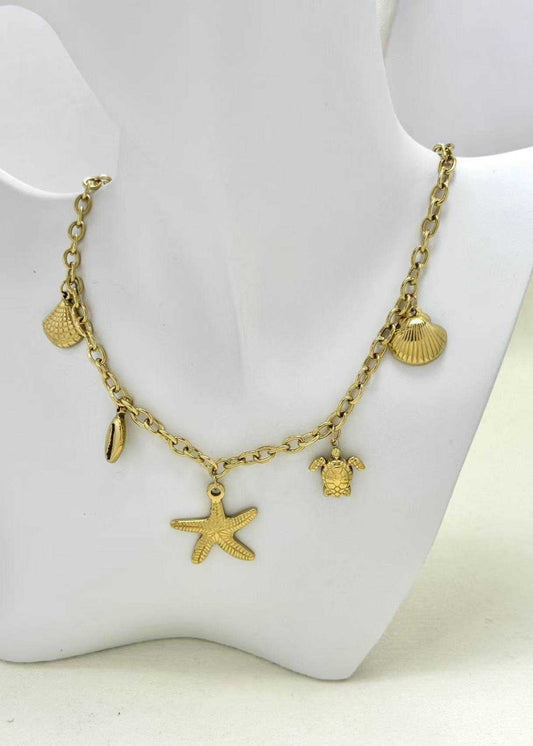 Stainless steel damesketting met beach bedels – schelpen, zeesterren, schildpadjes & meer. Verkleurt niet, waterproof, zomers & trendy.