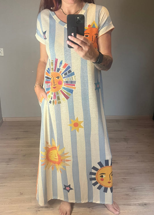 Schitterende lurex jurk met een zonnige print.