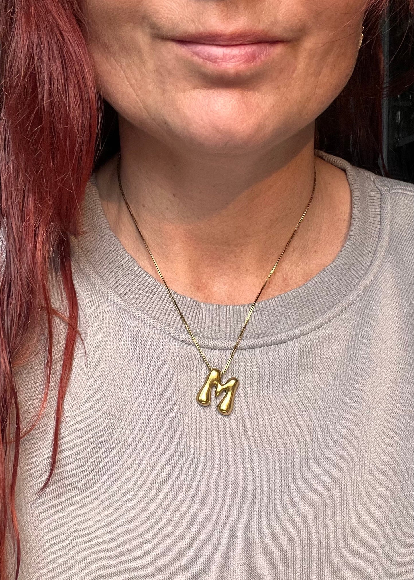 Stainless steel ketting met letter initialen hanger in bubble vorm in goud of zilver van Piek Fashion