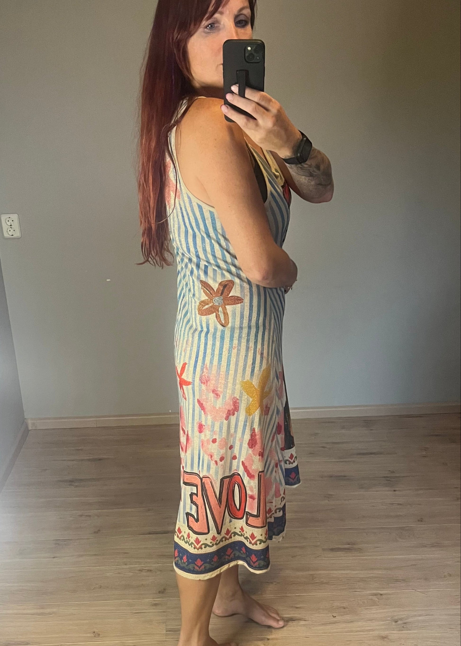 Schitterende lurex jurk met een damesprint.