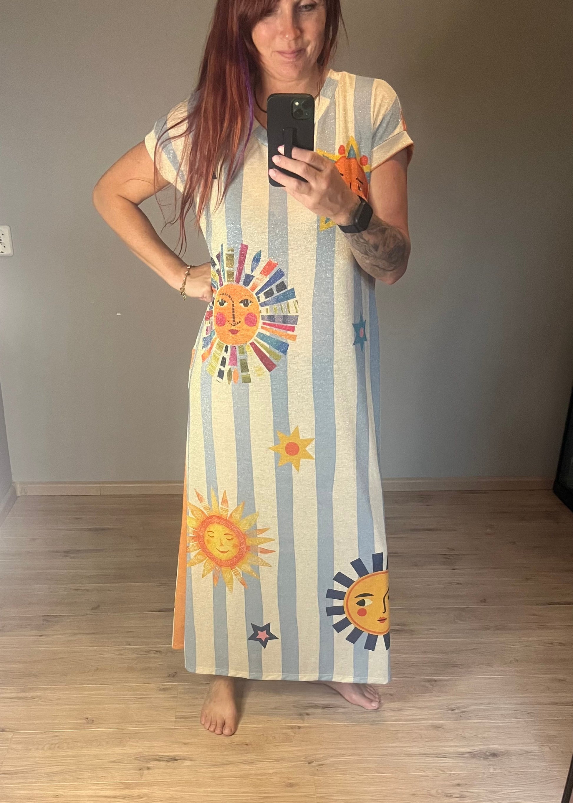 Schitterende lurex jurk met een zonnige print.