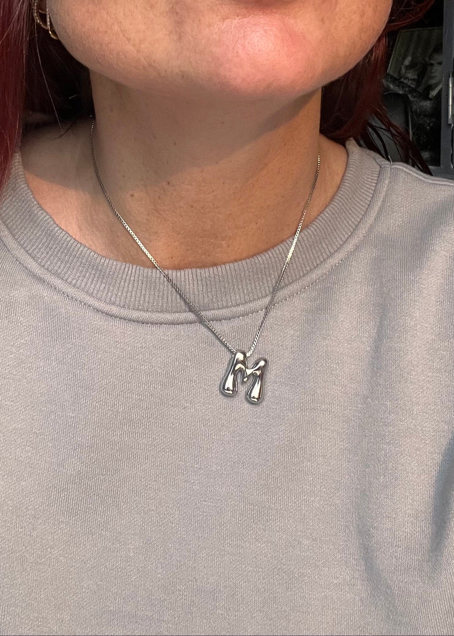 Stainless steel ketting met letter initialen hanger in bubble vorm in goud of zilver van Piek Fashion